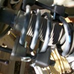 compressed strut spring